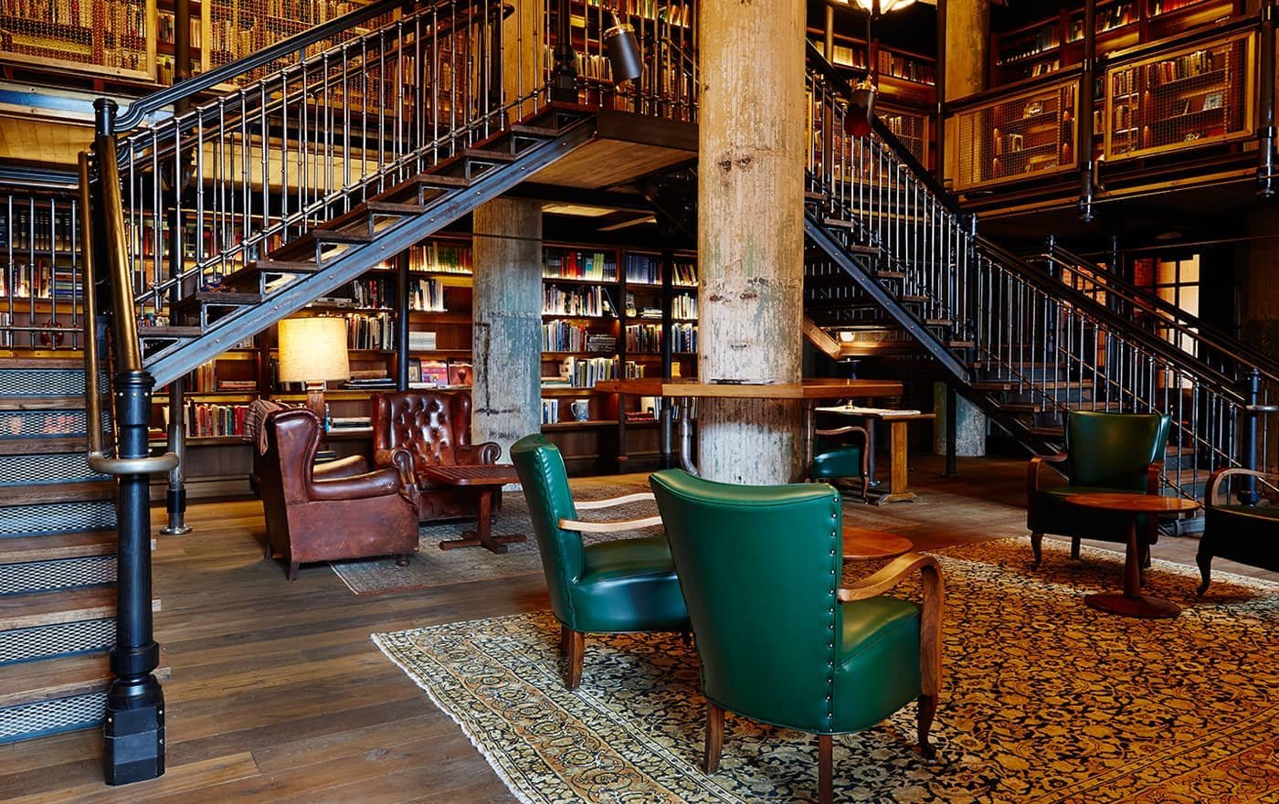 "Vintage Charm and Velvet Seats: Hotel Emma’s Iconic Reading Room"