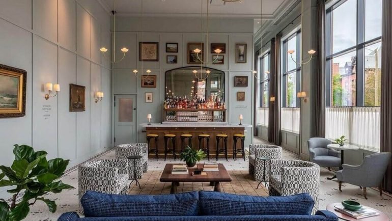 longfellows hotel saratoga :Elegant lounge at Longfellows Hotel with cozy seating and art.