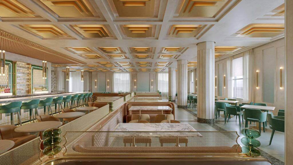 Elegant dining area with gold ceilings, teal chairs, and modern decor, featuring a bar and tables.